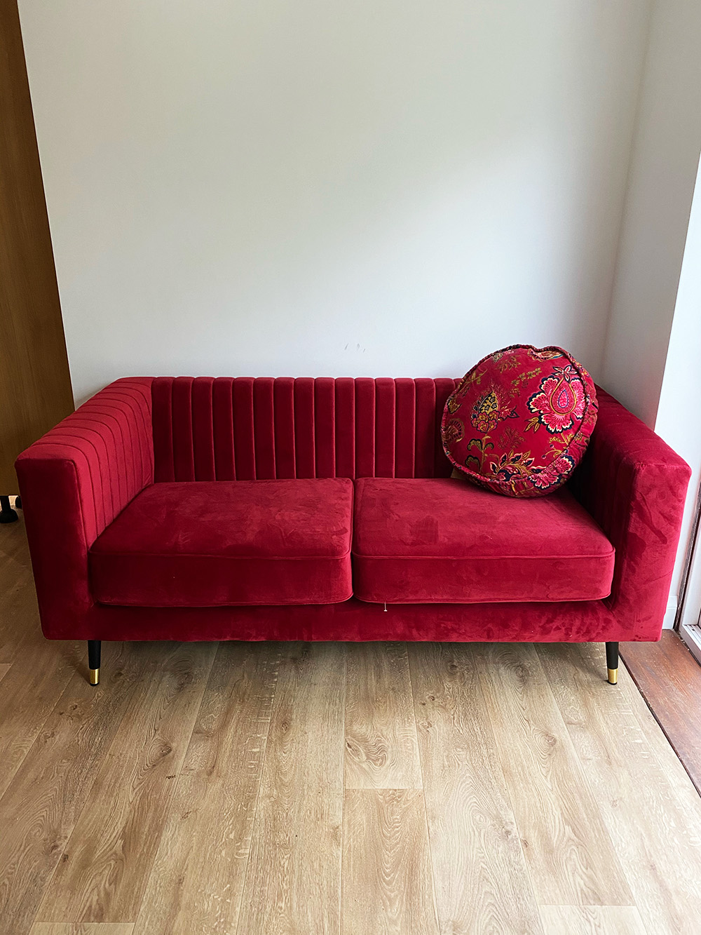 Red Slender sofa in cosy interior