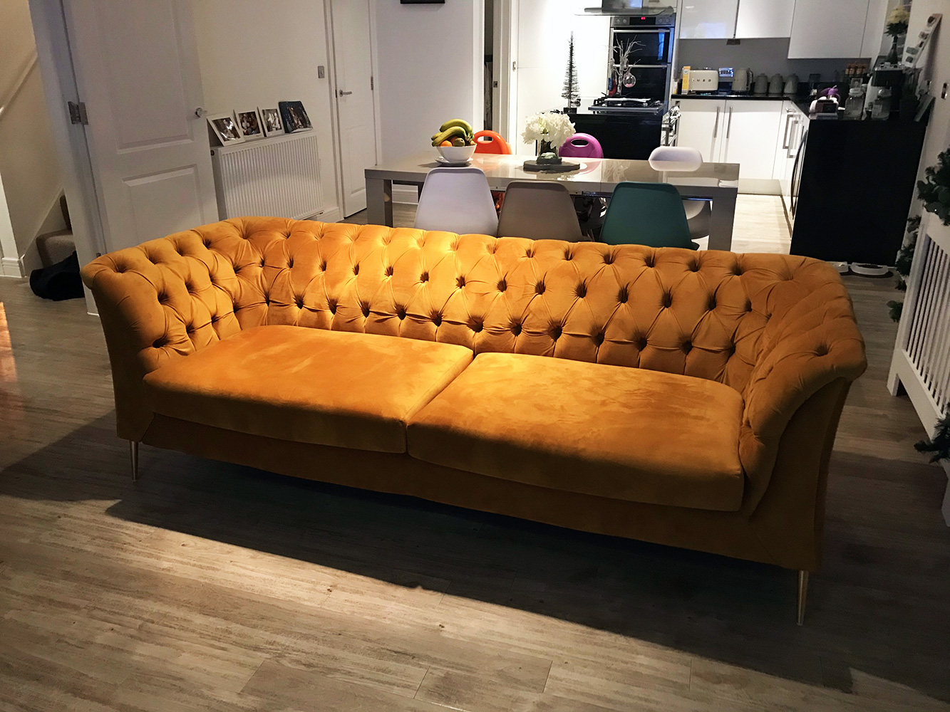 Mustard Chesterfield Modern sofa, gold-colored legs